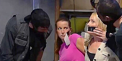 Blonde And Brunette Gagged With Black Tape